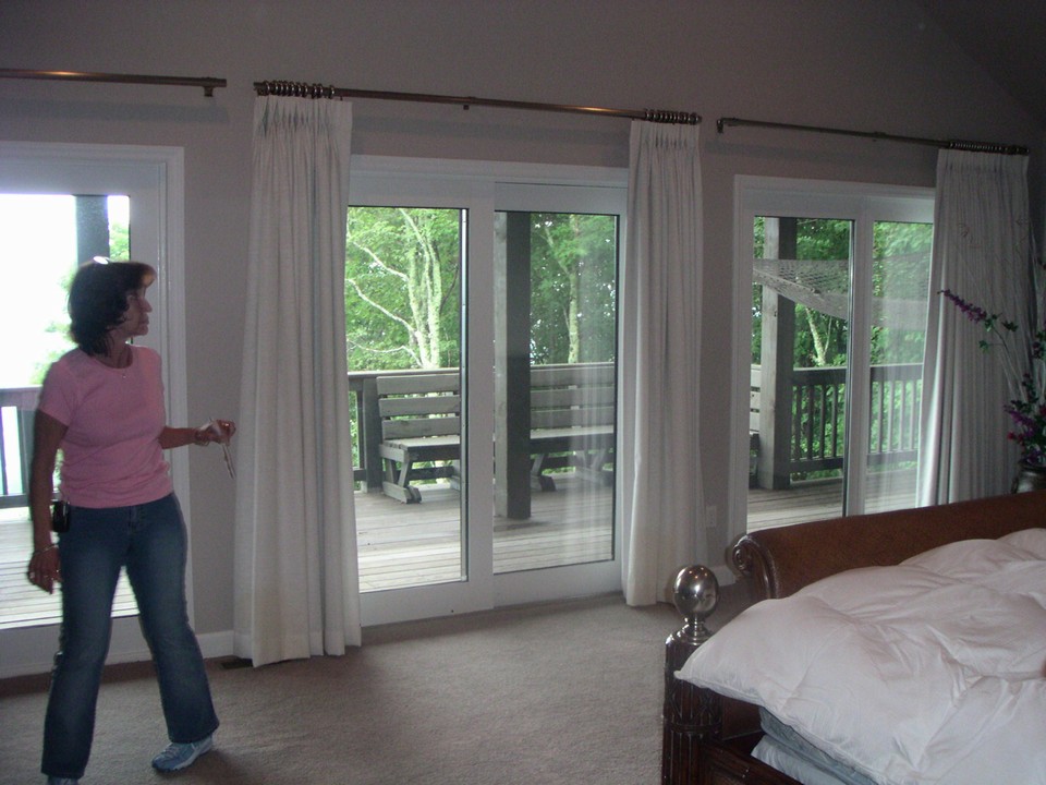 master bedroom with vaulted ceiling and great views